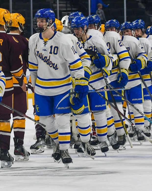 St. Cloud Cathedral boys hockey team shakes hands with Northfield on March 6 after the 2024 Class 1A state tournament opening round at the Xcel Energy Center in St. Paul. Cathedral won 5-1.